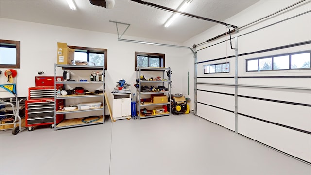 87 Velvet Grv, Eureka, MT 59917 - garage featuring a garage door opener