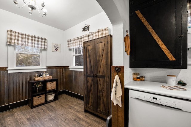 bedroom with vaulted ceiling, a textured wall, wood finished floors, and ceiling fan