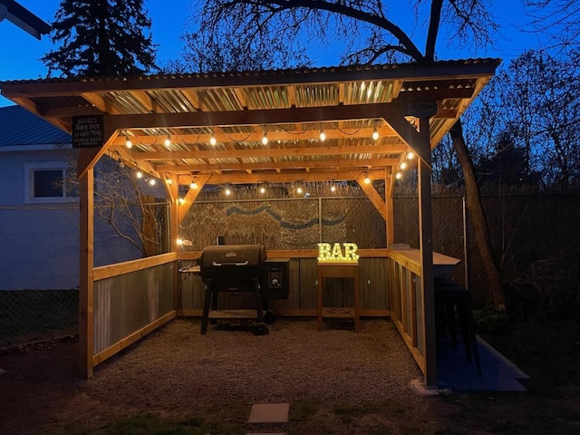 view of patio / terrace featuring fence, grilling area, and a pergola