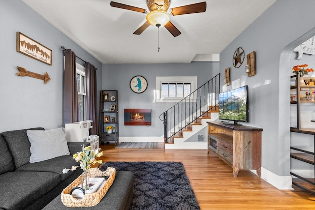 dining space featuring a textured wall, wood finished floors, visible vents, and a chandelier