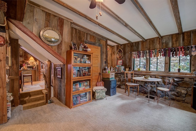 exterior space with wood ceiling, wooden walls, and a skylight