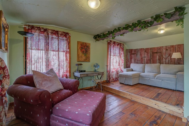 bathroom featuring hardwood / wood-style floors, vanity, shower / tub combination, and toilet