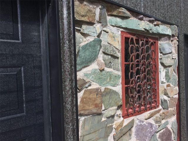 view of home's exterior with stone siding