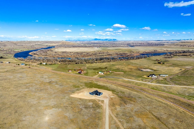 drone / aerial view with a rural view and a mountain view