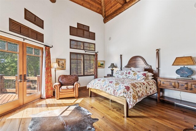 231 Arrowhead Dr, Whitefish, MT 59937 - bedroom featuring high vaulted ceiling, wooden ceiling, hardwood / wood-style floors, access to exterior, and french doors