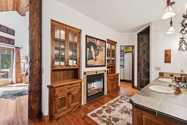 231 Arrowhead Dr, Whitefish, MT 59937 - living room featuring dark wood-style flooring and a fireplace