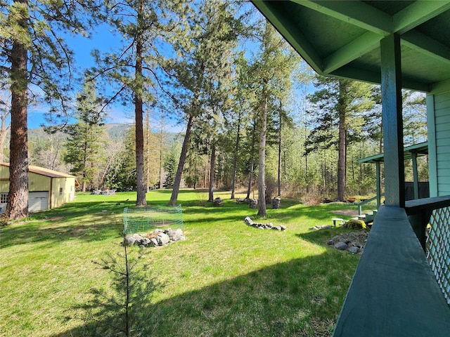 view of yard with a garage