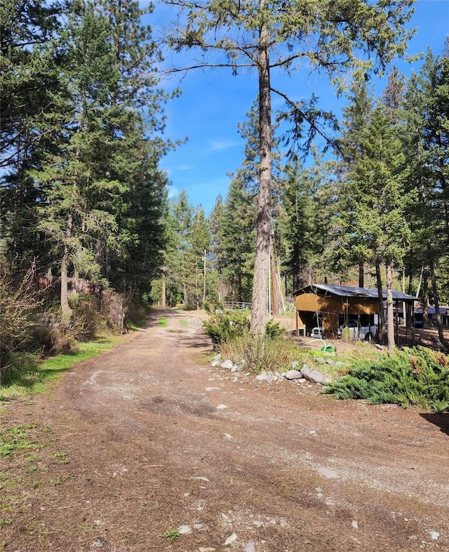 view of road featuring a view of trees