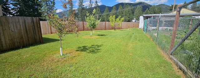 57 Fir St, Trout Creek, MT 59874 - fenced backyard featuring a mountain view