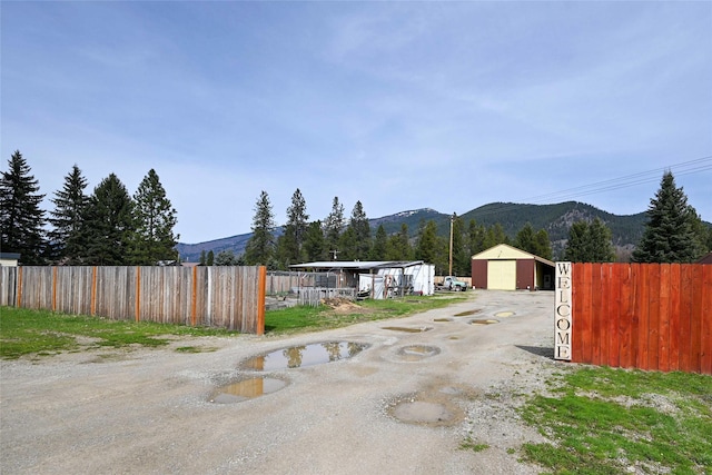 57 Fir St, Trout Creek, MT 59874 - view of dirt / gravel driveway featuring a mountain view