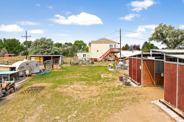 view of yard with an exterior structure and an outdoor structure