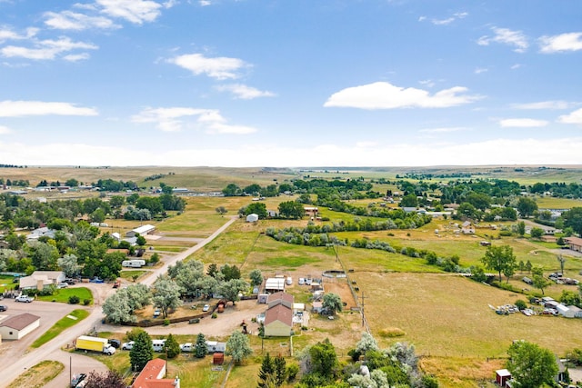 birds eye view of property featuring a rural view