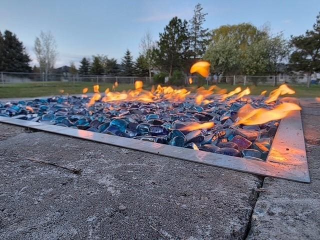 3469 Birkland Dr, Helena, MT 59602 - view of swimming pool with a fire pit