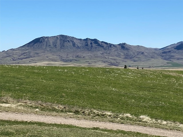 view of mountain feature with a rural view