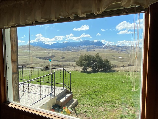 view of mountain feature with a rural view