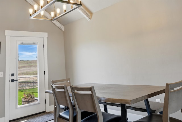 dining room featuring a notable chandelier