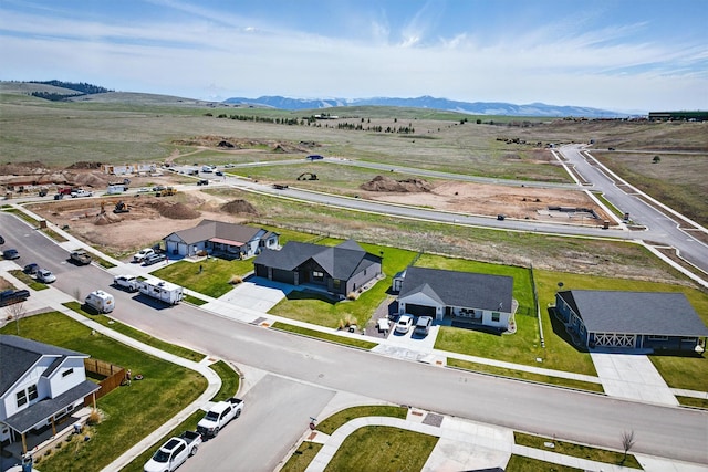 bird's eye view with a residential view and a mountain view