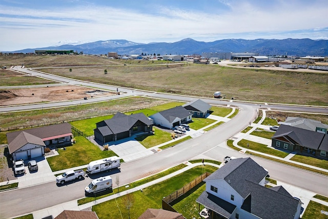 drone / aerial view featuring a mountain view