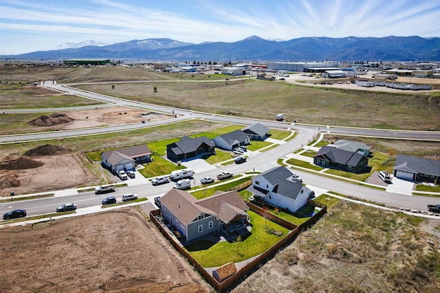 bird's eye view featuring a residential view and a mountain view