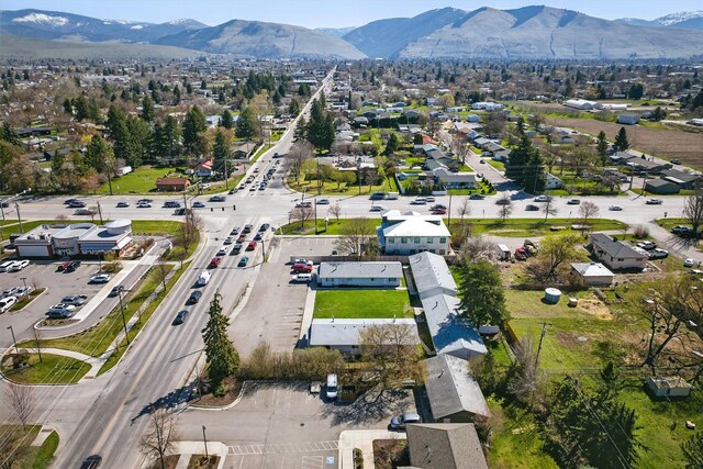 drone / aerial view featuring a mountain view