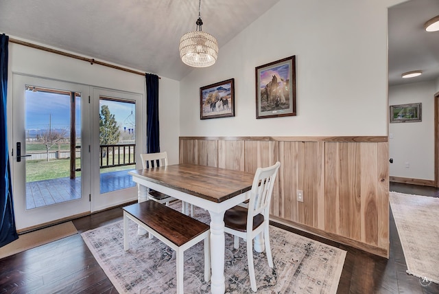 3570 Juniper Dr, Helena, MT 59602 - dining room with a chandelier, lofted ceiling, and dark wood-style floors