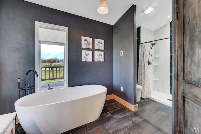 3570 Juniper Dr, Helena, MT 59602 - bathroom featuring a soaking tub, a textured wall, a stall shower, and lofted ceiling