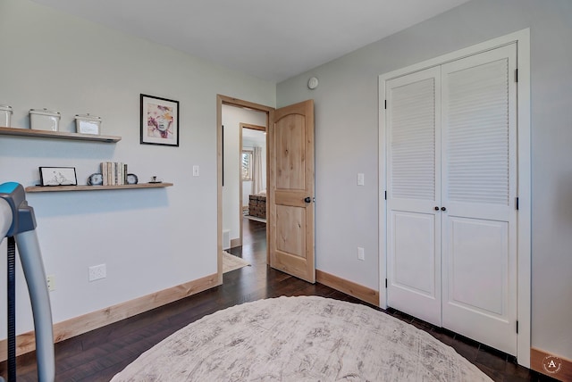 3570 Juniper Dr, Helena, MT 59602 - bedroom with a closet and dark wood-style floors