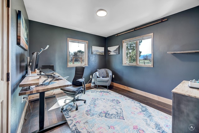 3570 Juniper Dr, Helena, MT 59602 - home office with healthy amount of natural light and wood finished floors