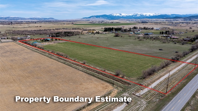 3570 Juniper Dr, Helena, MT 59602 - aerial view of sparsely populated area featuring property boundaries highlighted and a mountain backdrop
