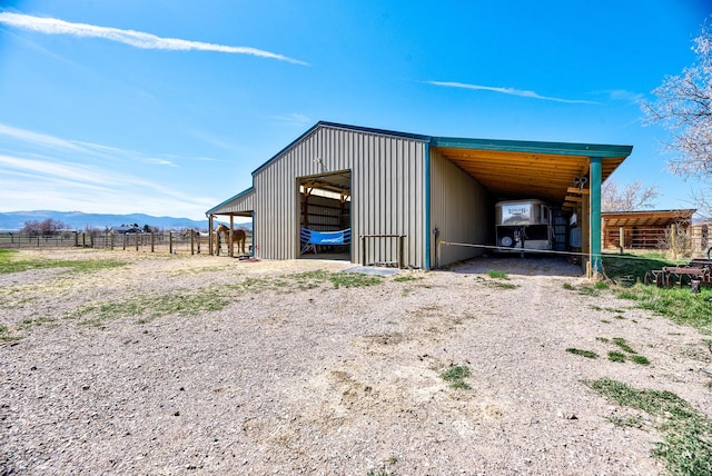 3570 Juniper Dr, Helena, MT 59602 - view of pole building featuring a mountain view