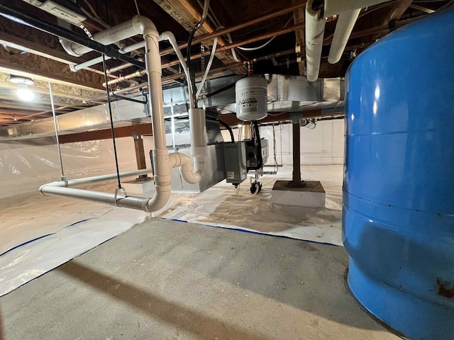 3570 Juniper Dr, Helena, MT 59602 - unfinished below grade area featuring a water pressure tank