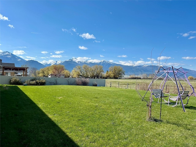 262 Birch Ln, Stevensville, MT 59870 - view of yard featuring a mountain view and fence