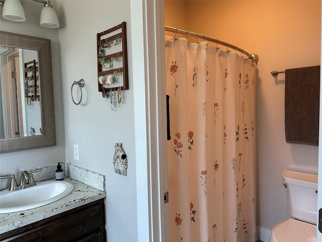 262 Birch Ln, Stevensville, MT 59870 - full bathroom featuring vanity and toilet