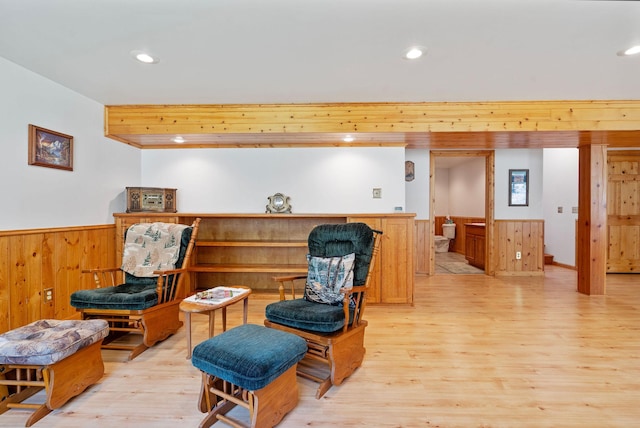 1000 Kelley Rd, Columbia Falls, MT 59912 - sitting room featuring wainscoting, light wood-type flooring, wooden walls, and recessed lighting