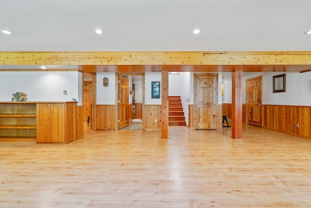 1000 Kelley Rd, Columbia Falls, MT 59912 - workout room featuring wainscoting, wood walls, light wood-style flooring, and recessed lighting