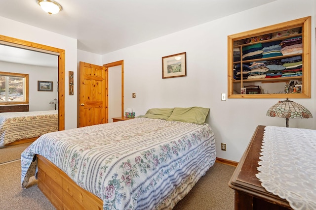 1000 Kelley Rd, Columbia Falls, MT 59912 - bedroom with carpet floors and baseboards