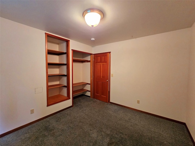 225 Marten Creek Rd, Trout Creek, MT 59874 - unfurnished bedroom with dark colored carpet and a closet