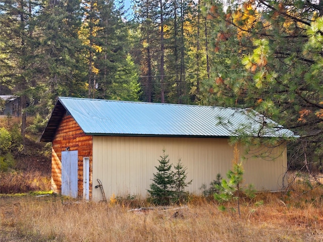 225 Marten Creek Rd, Trout Creek, MT 59874 - view of outbuilding featuring a wooded view