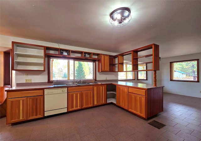225 Marten Creek Rd, Trout Creek, MT 59874 - kitchen with open shelves, dishwasher, healthy amount of natural light, and a peninsula
