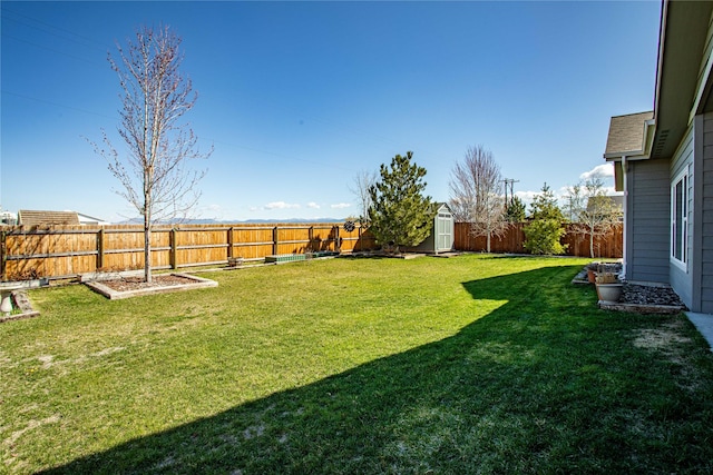 view of yard featuring a fenced backyard, an outdoor structure, and a storage shed