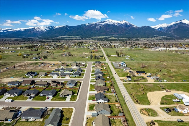 bird's eye view featuring a residential view and a mountain view
