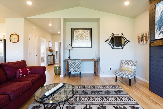 276 Tenderfoot Ln, Stevensville, MT 59870 - living room featuring light wood-style floors, baseboards, and lofted ceiling
