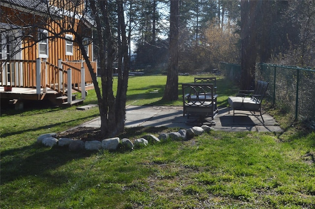 113 Cougar Trl, Whitefish, MT 59937 - view of yard with fence and a patio area