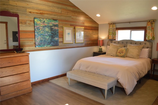 113 Cougar Trl, Whitefish, MT 59937 - bedroom with recessed lighting, lofted ceiling, wood walls, and wood finished floors