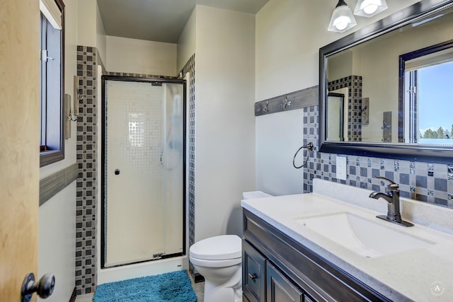24 Hilltop Dr, Clancy, MT 59634 - bathroom featuring a stall shower, vanity, and decorative backsplash