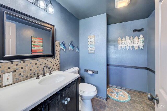 24 Hilltop Dr, Clancy, MT 59634 - bathroom with vanity, tasteful backsplash, and tile patterned floors