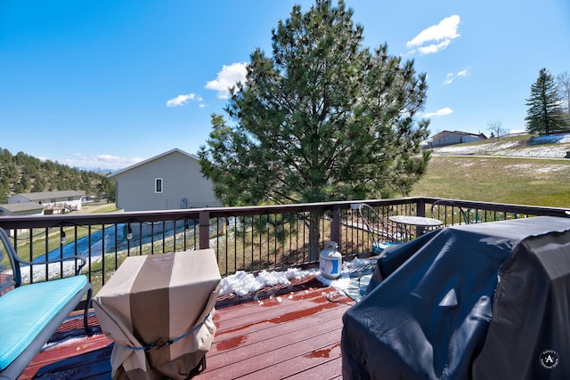 24 Hilltop Dr, Clancy, MT 59634 - wooden terrace with a grill