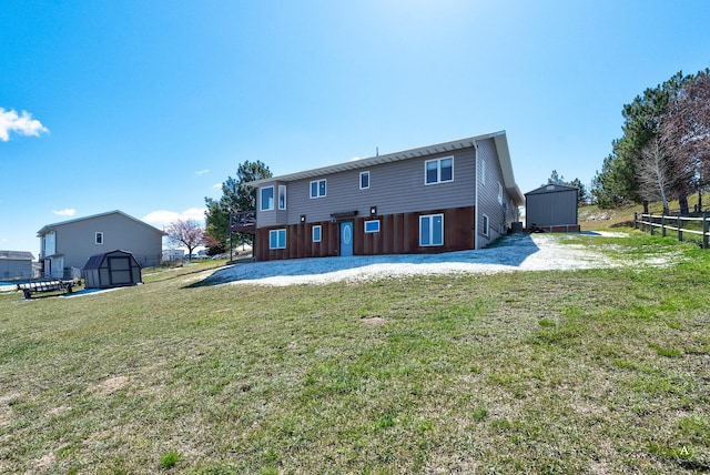 24 Hilltop Dr, Clancy, MT 59634 - back of property featuring a storage shed