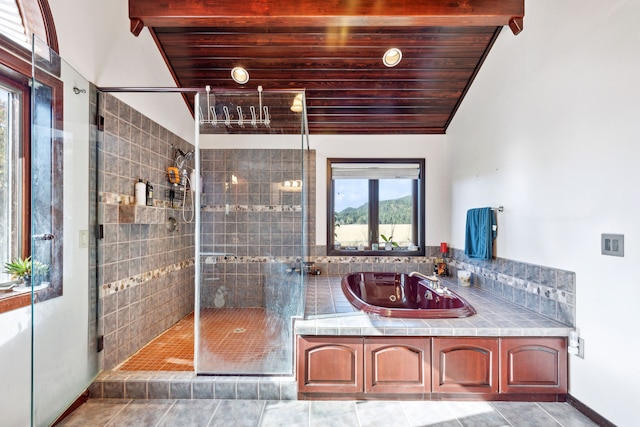 2549 Horseshoe Hills Trl, Seeley Lake, MT 59868 - full bathroom with a tub with jets, a shower stall, tile patterned floors, and wood ceiling