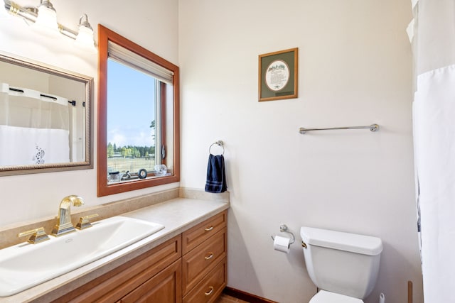 2549 Horseshoe Hills Trl, Seeley Lake, MT 59868 - full bathroom featuring vanity and toilet